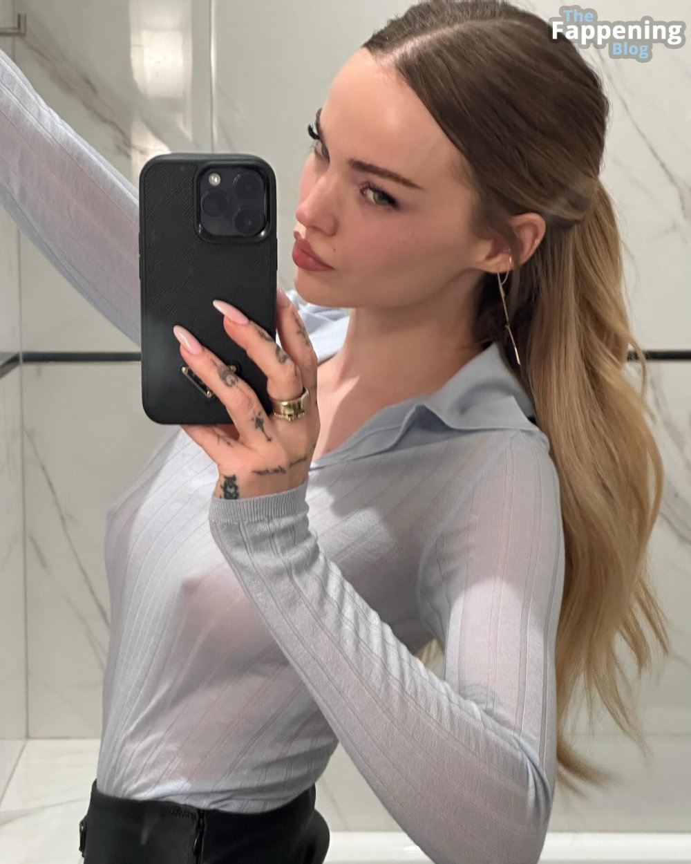 Dove-Cameron-Braless-3-The-Fappening-Blog.jpg